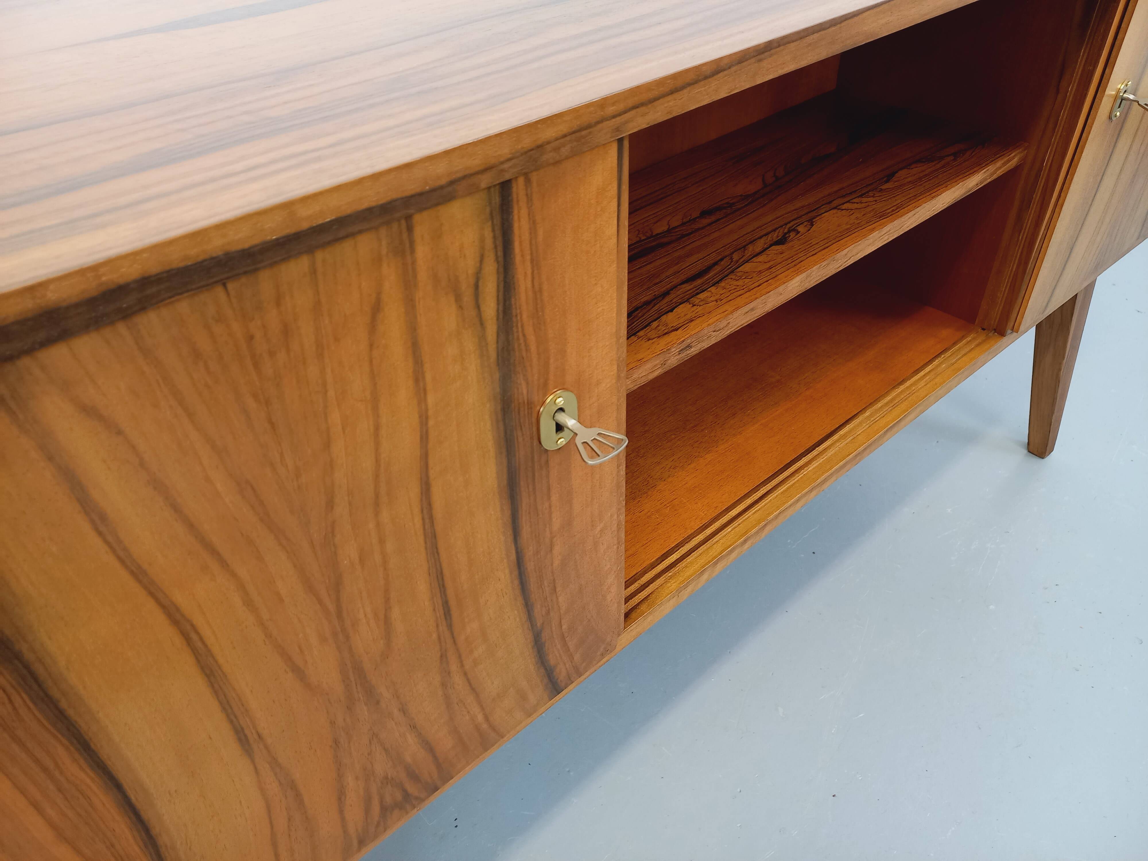 Double-sided executive desk in vintage Scandinavian style made of rosewood.