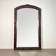 Large mirror (2 metres) Art Nouveau in carved mahogany with high-relief decoration.