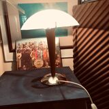 Table lamp legs chrome wood lampshade opaque glass.