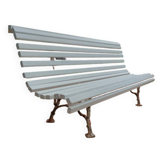 Garden bench with old cast iron legs