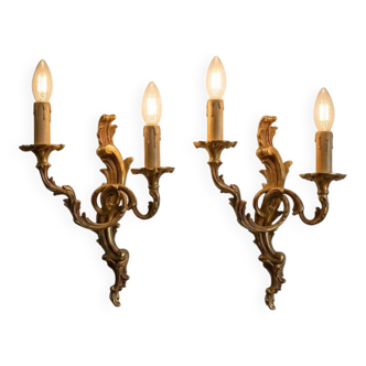 Pair of Louis XV style bronze wall sconces