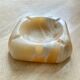Beige alabaster ashtray