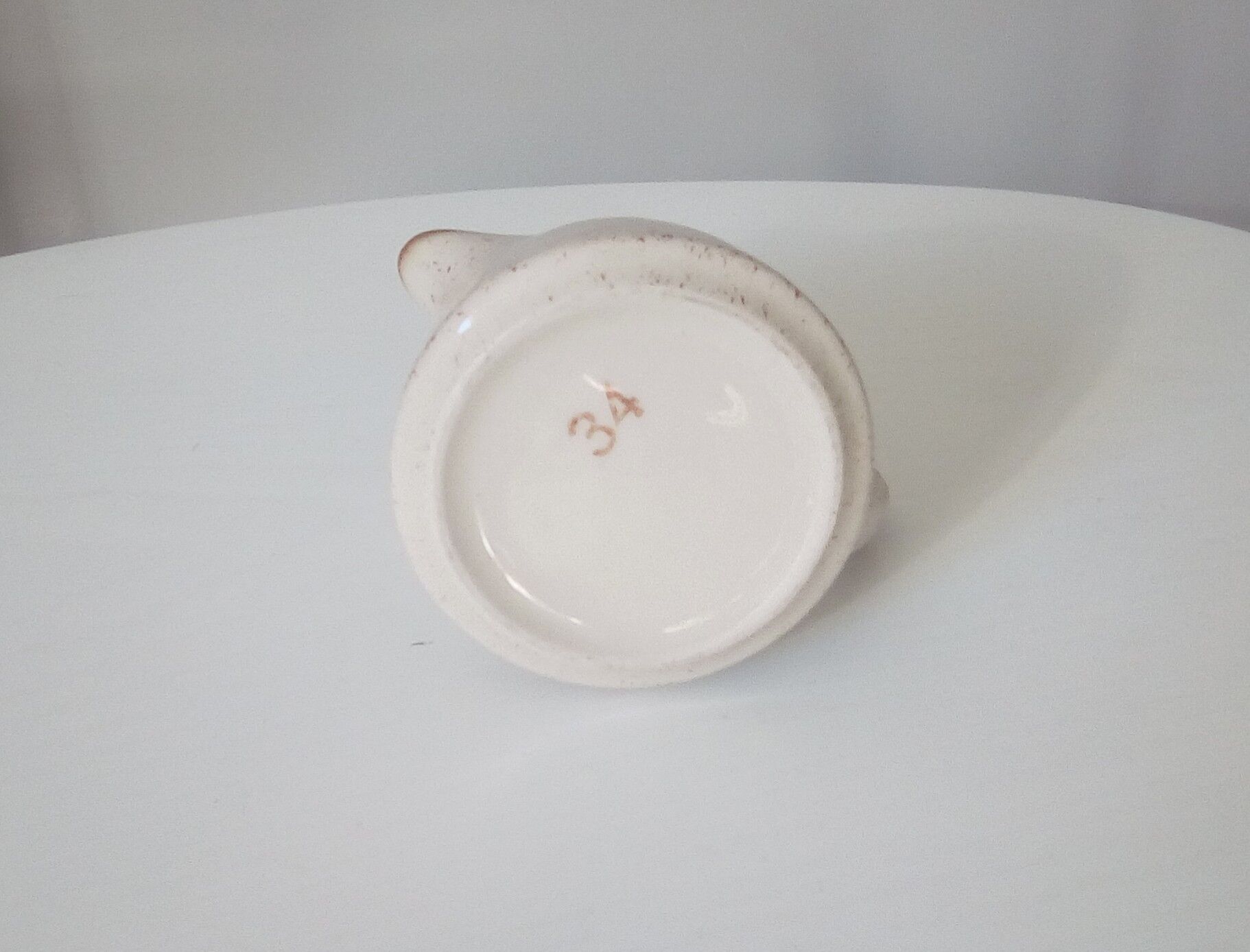 Speckled sandstone milk pitcher