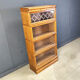 Four tier oak barrister style bookcase with leaded glass