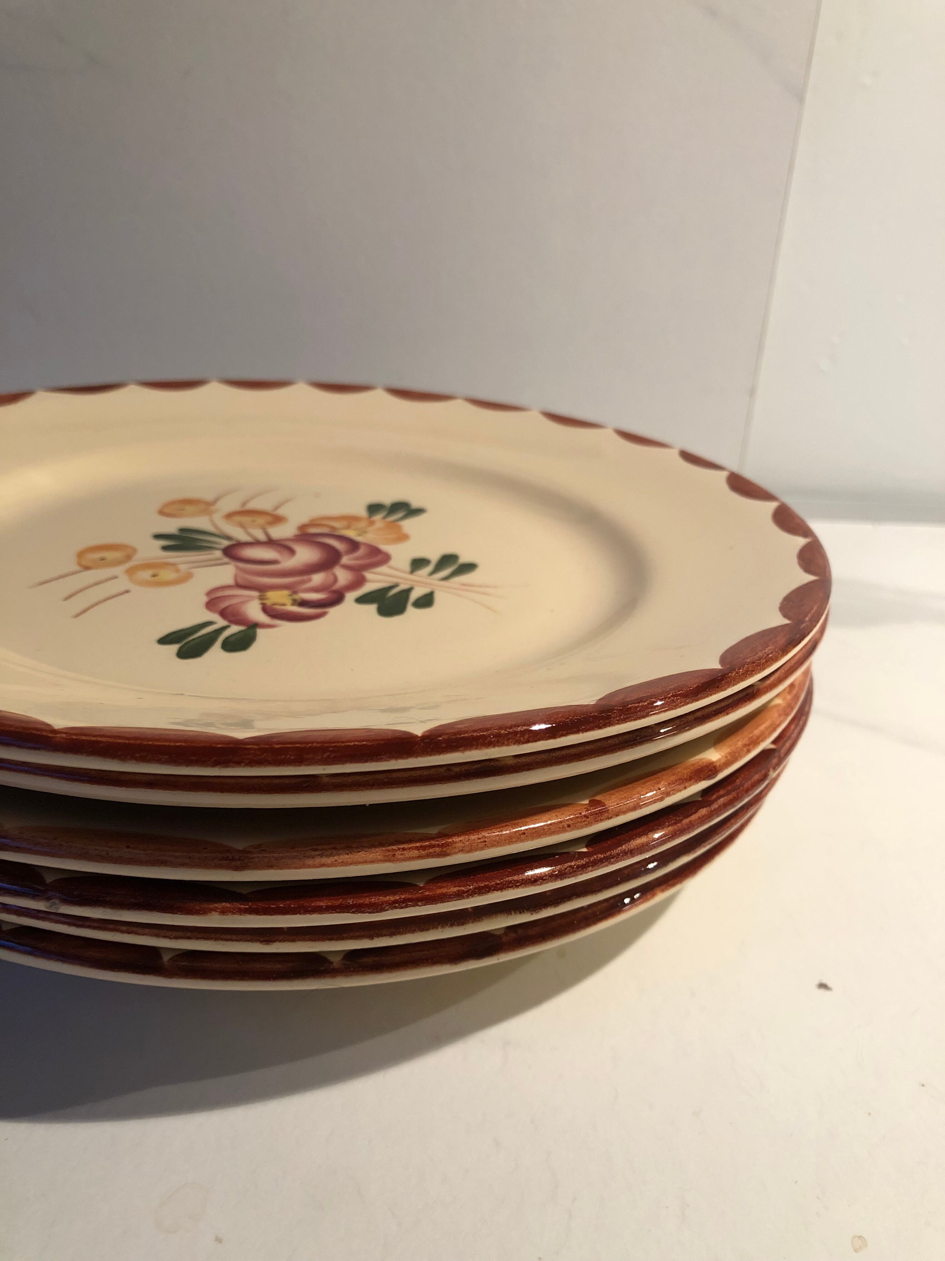 Six vintage Longchamp earthenware plates