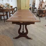English desk in solid mahogany with lion paws. Leather top