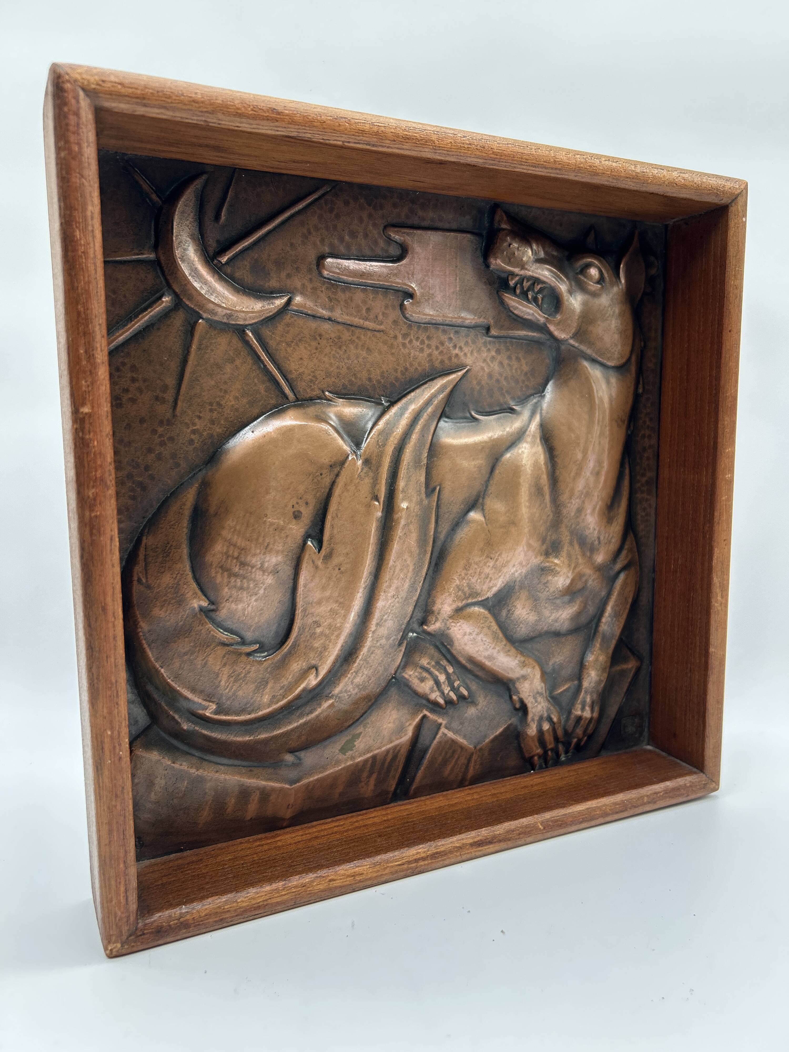 Art deco bas-relief in maredsous brasswork.