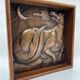 Art deco bas-relief in maredsous brasswork.