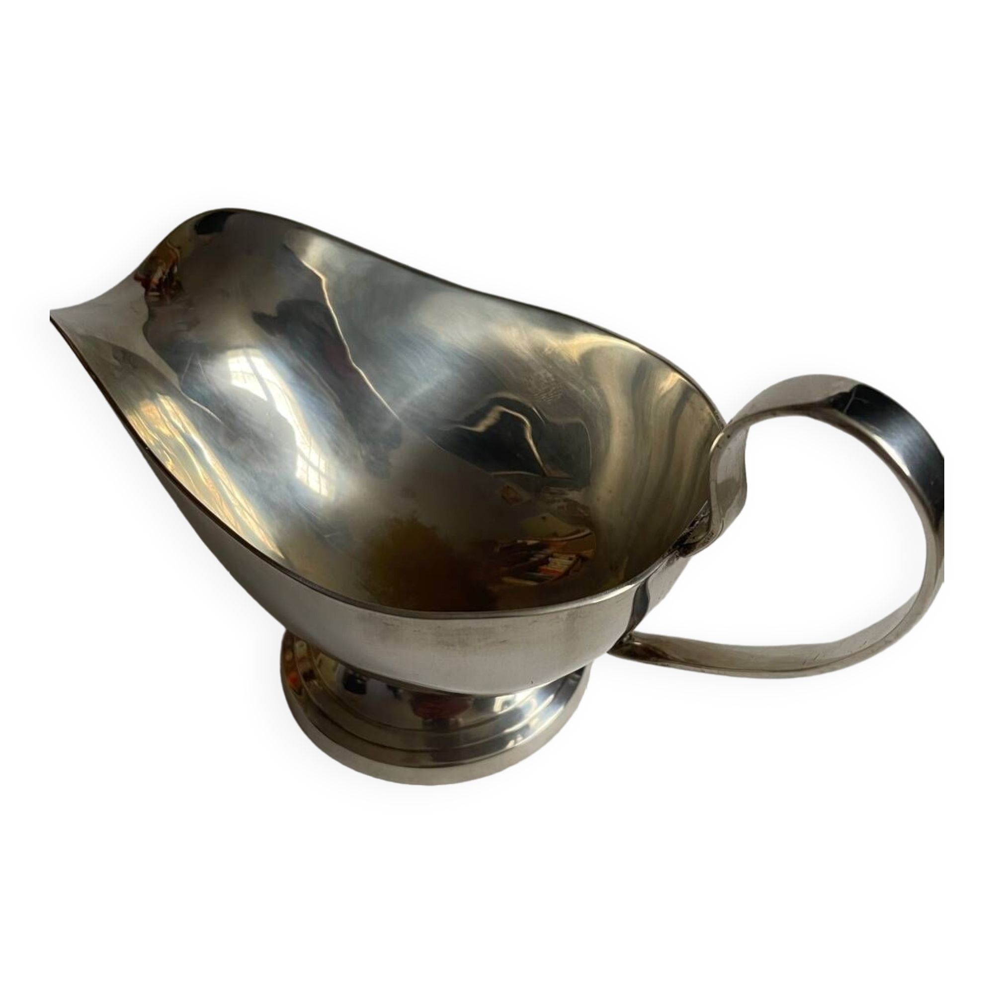 Silver metal sauce boat