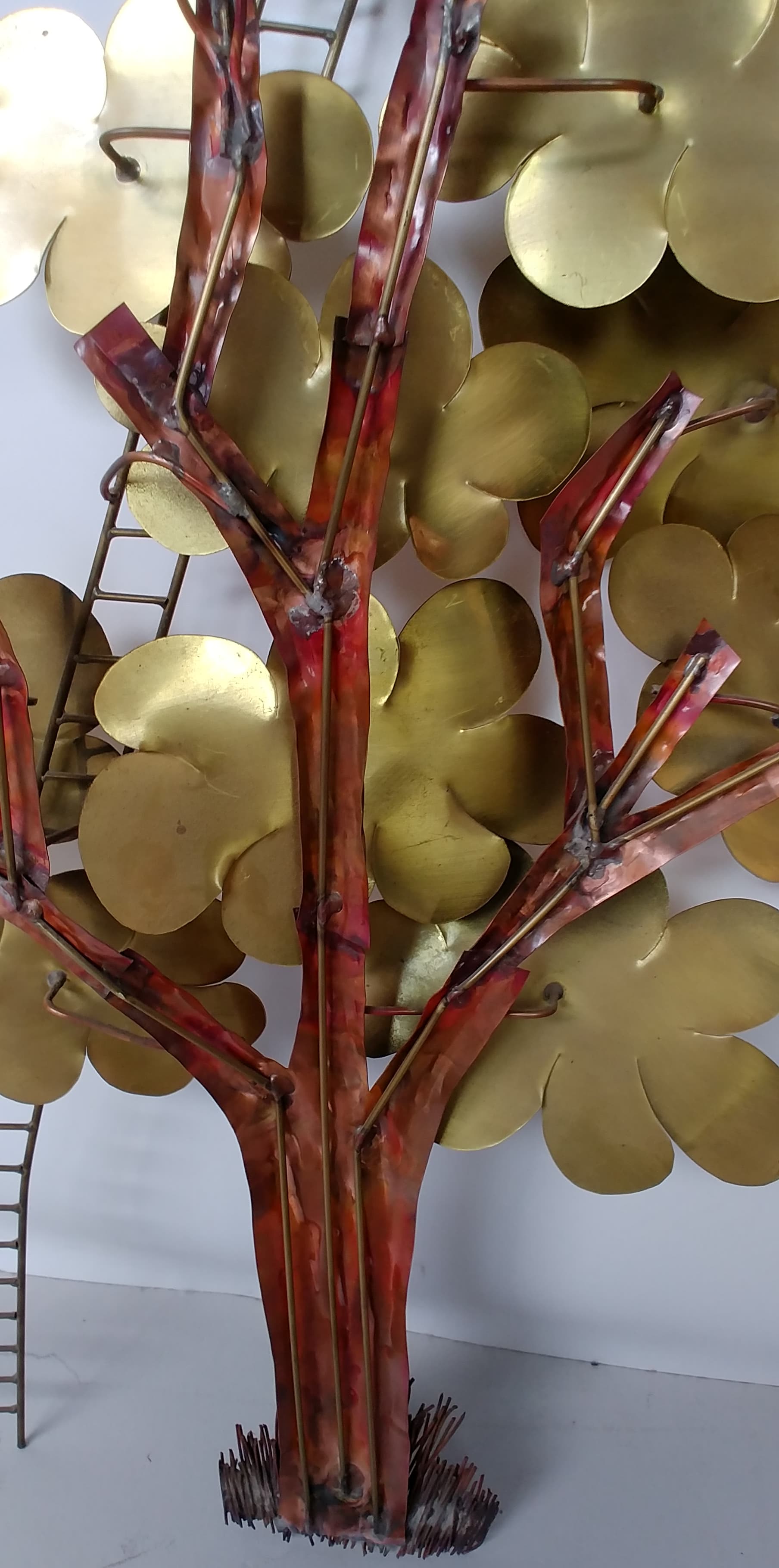 Daniel d'Haeseleer's brass mural sculpture