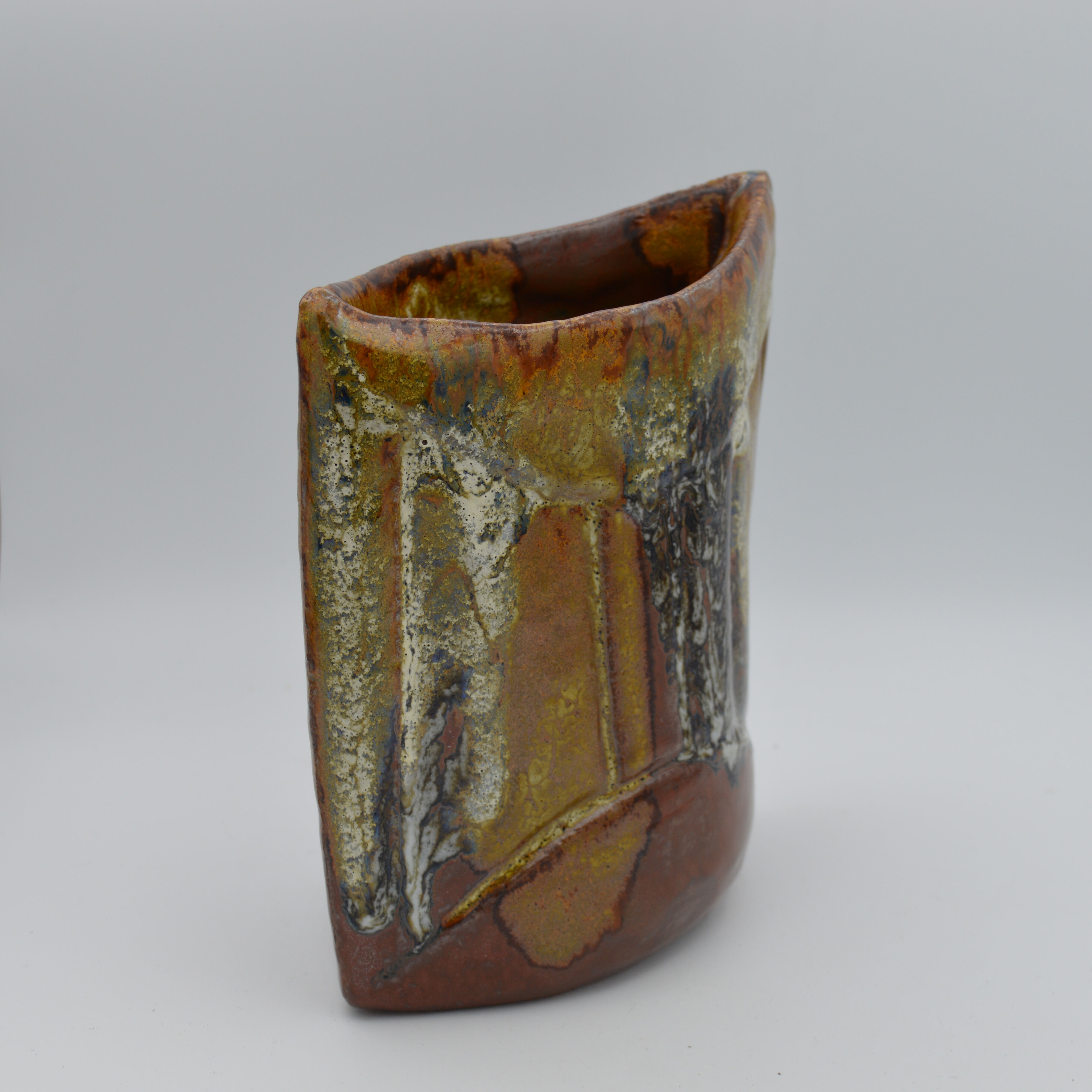 Enamelled sandstone vase