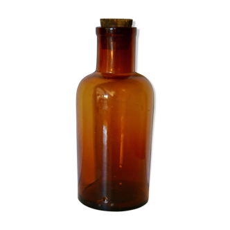 Amber glass apothecary bottle and the cork