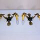 Empire bronze sconces with decorations of swans, palmettes and acanthus leaves