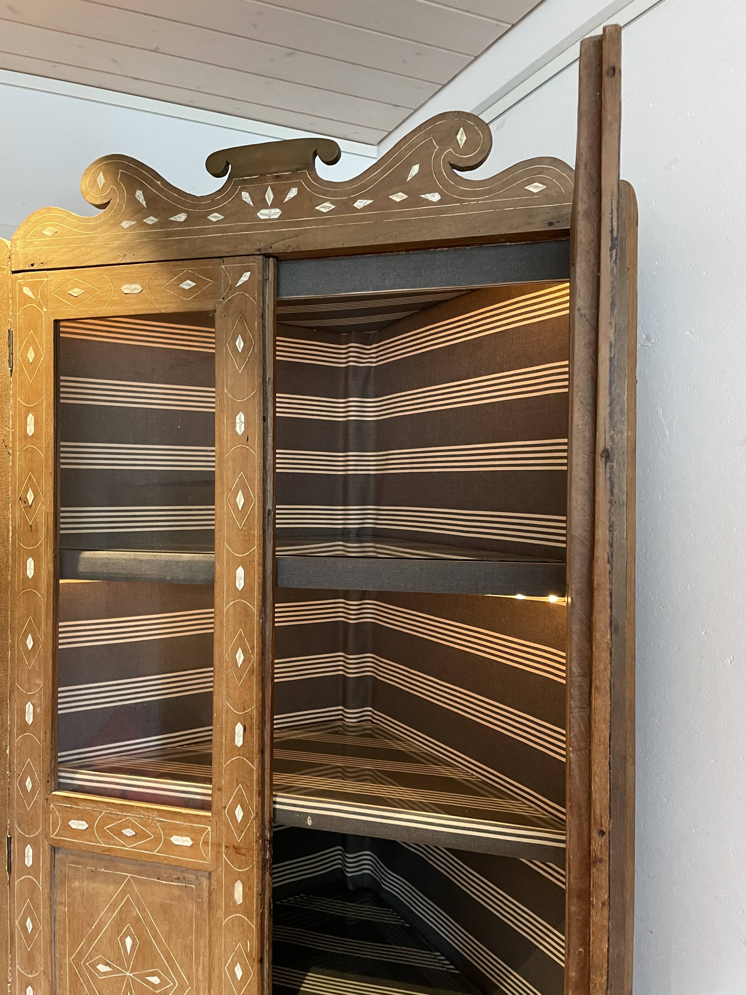 Oriental corner cabinet