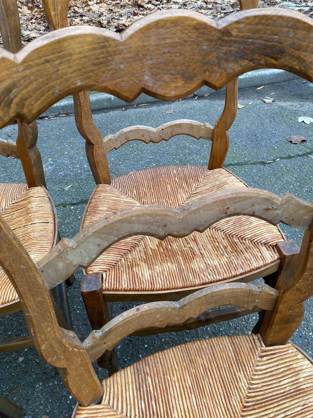 Four Louis XV chairs in solid oak and straw seats, 19th century