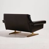 Two-seater leather sofa