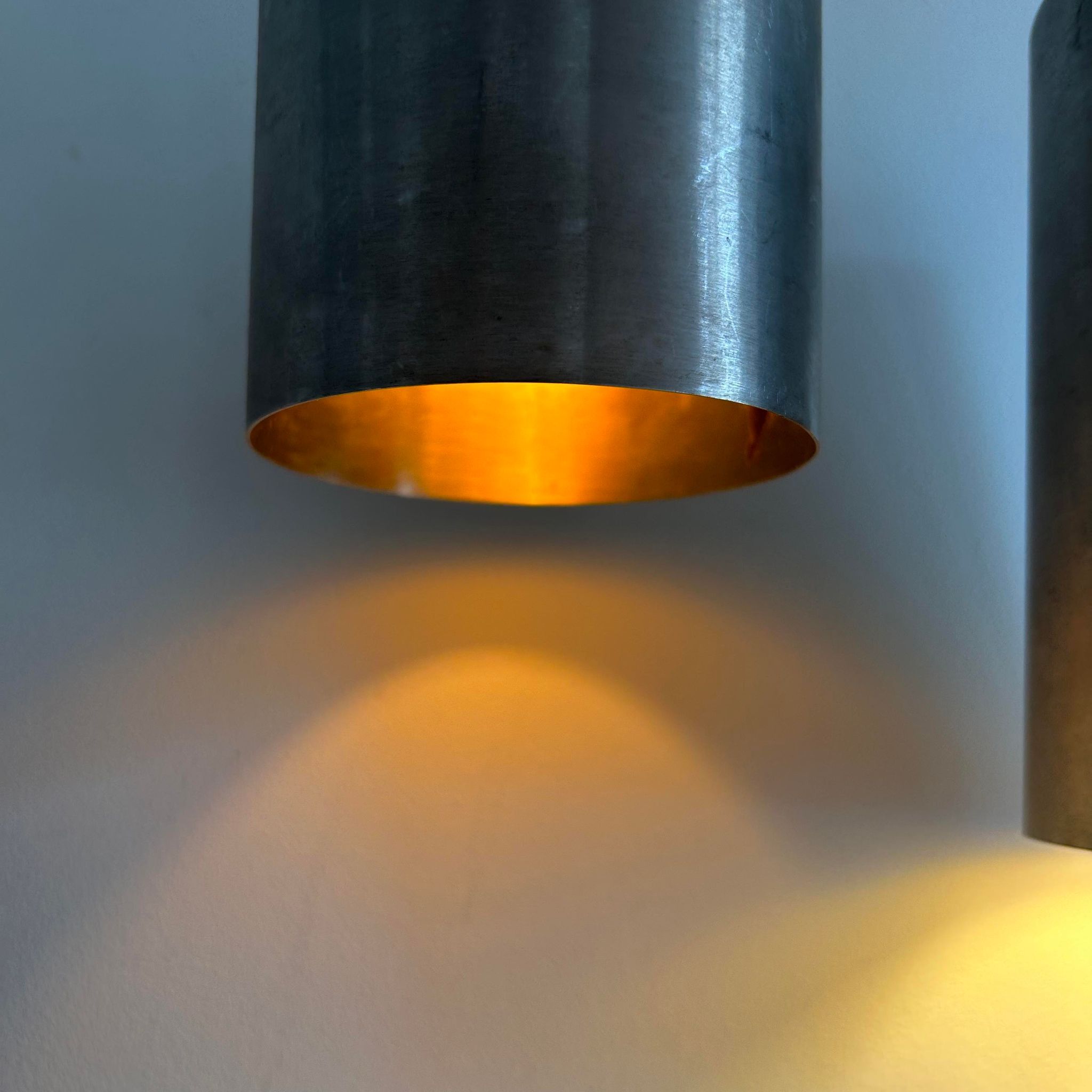 Pair of vintage brushed metal pendant lamps, France 1960