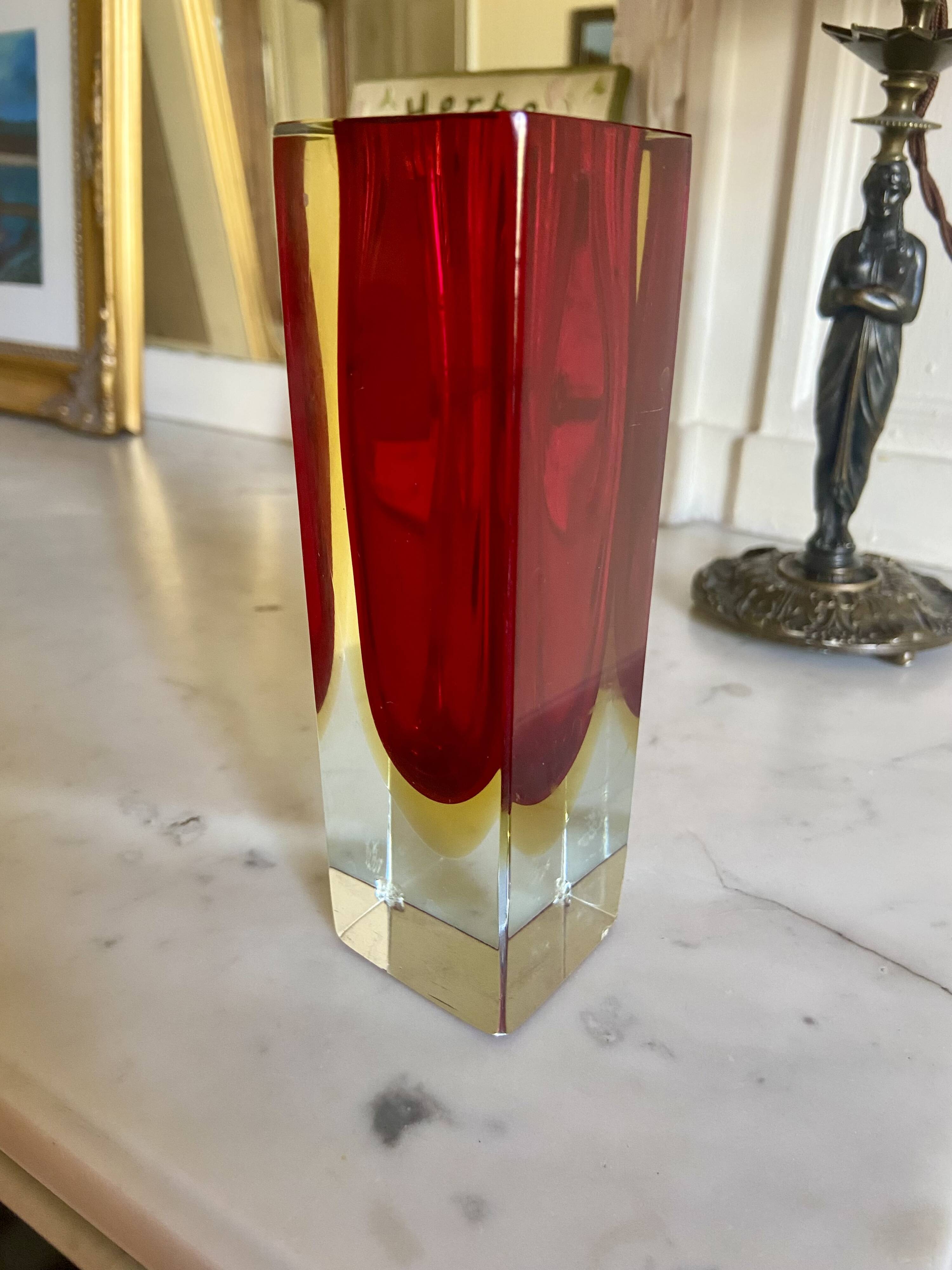 Small red vase made of Murano glass.