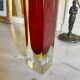 Small red vase made of Murano glass.