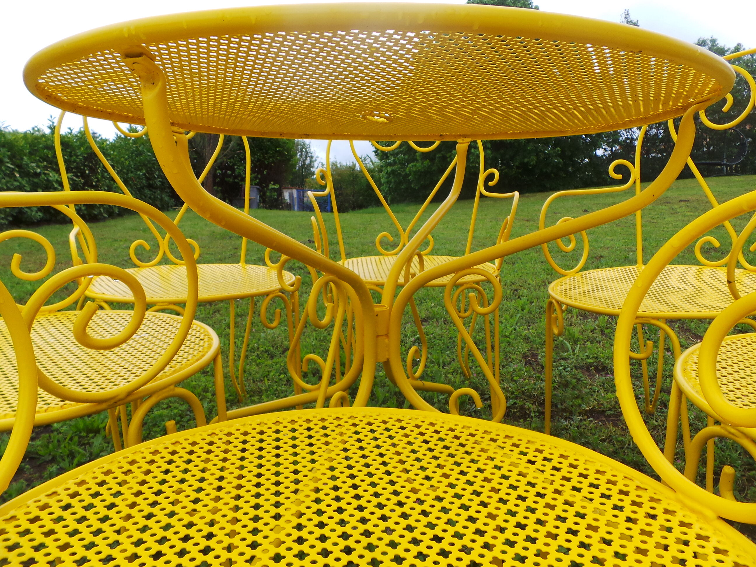 Yellow wrought iron garden room