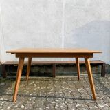 Dining table with tapered legs