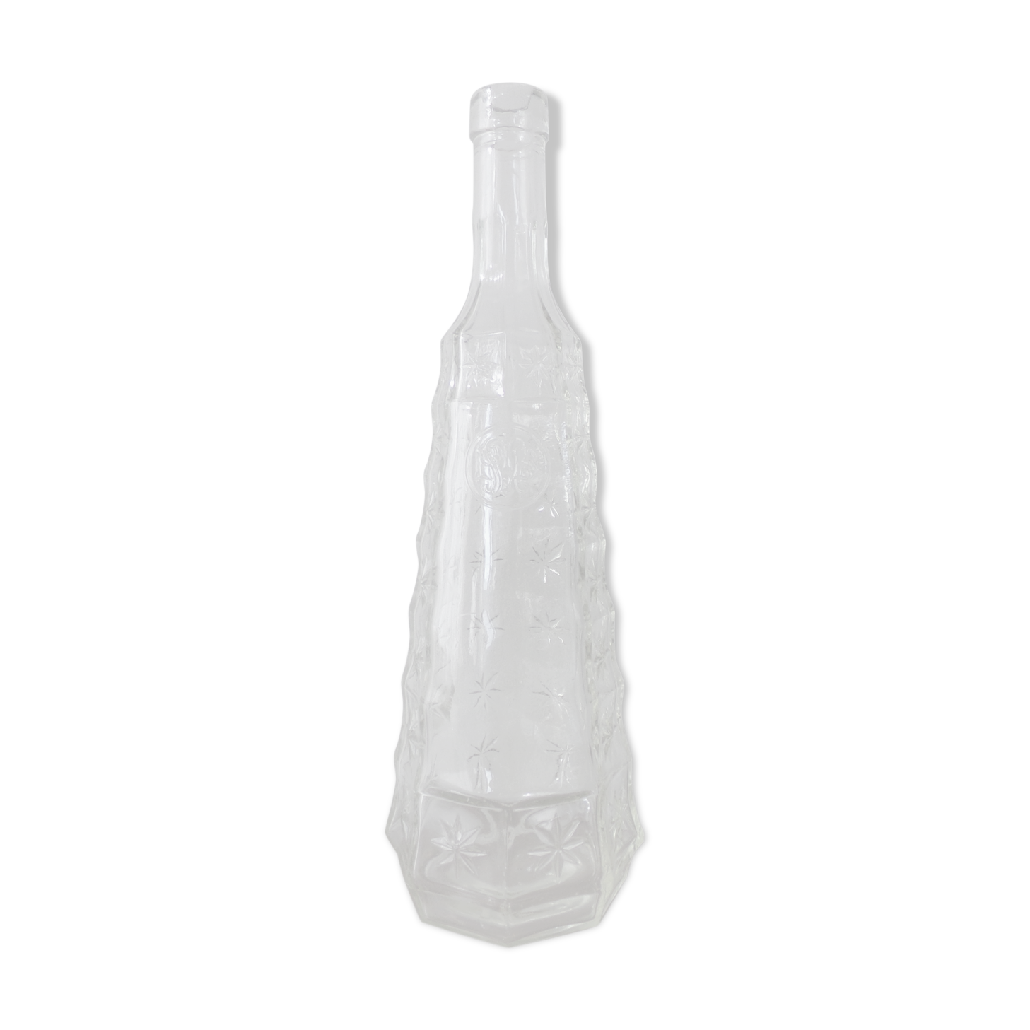 Chiseled glass bottle