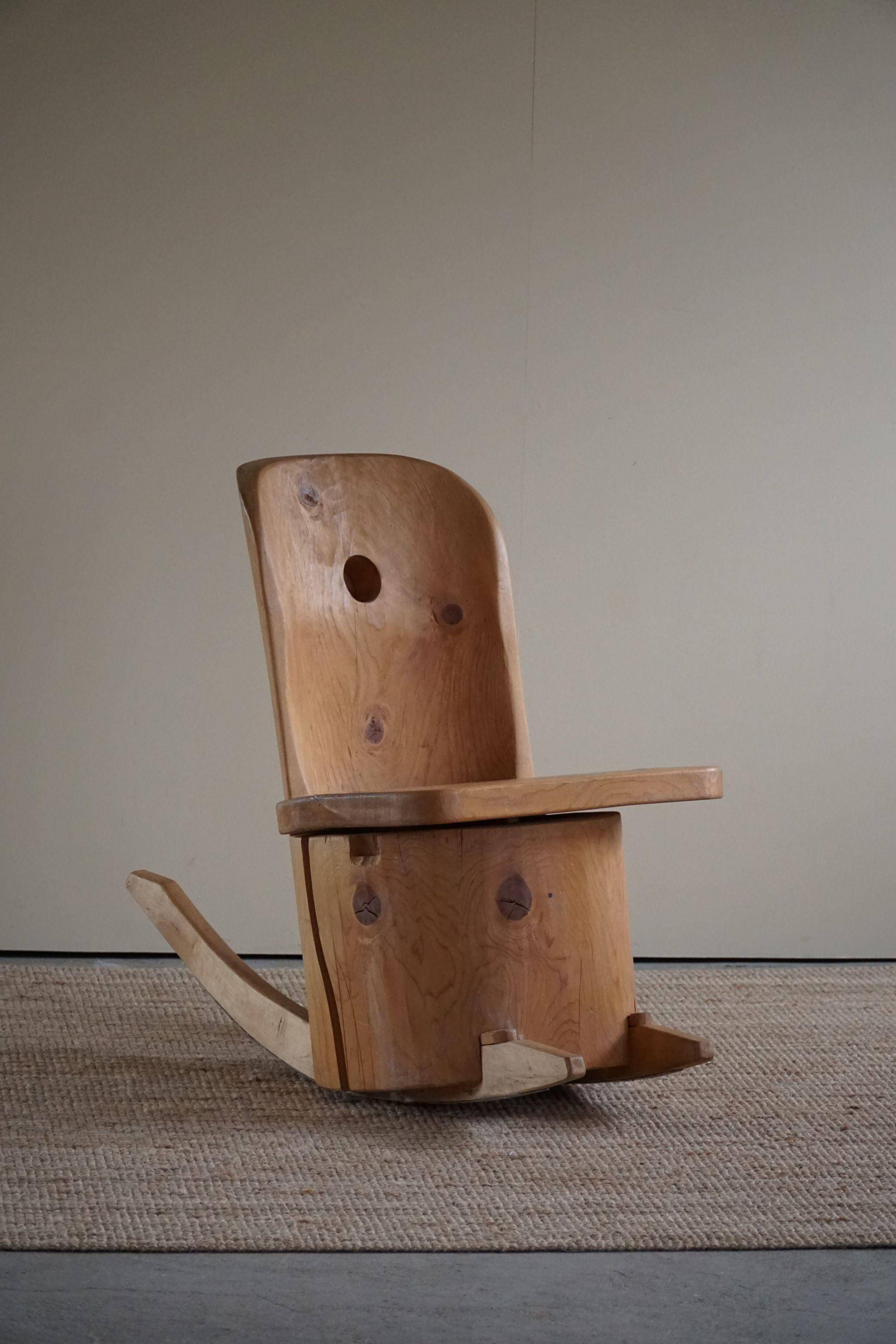 Unique sculptural rocking chair by the Finnish Matti Martikka in solid pine, 1960s.