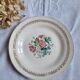 Flat antique earthenware plates with gilded edges