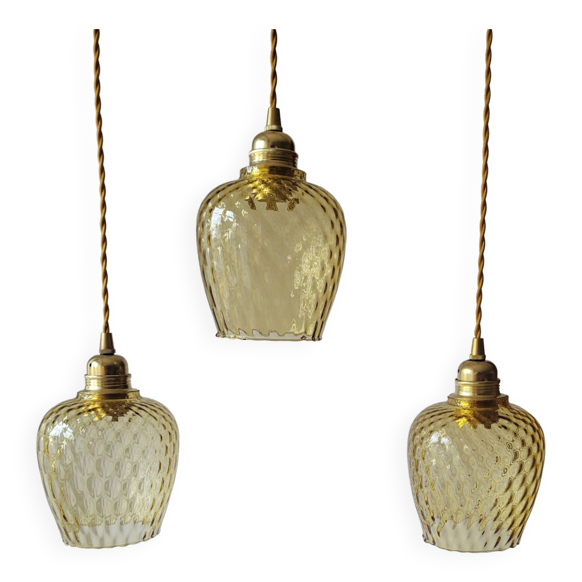Trio of yellow glass pendant lights