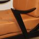 Paire de fauteuils vintage années 50 en bois noir et cuir caramel