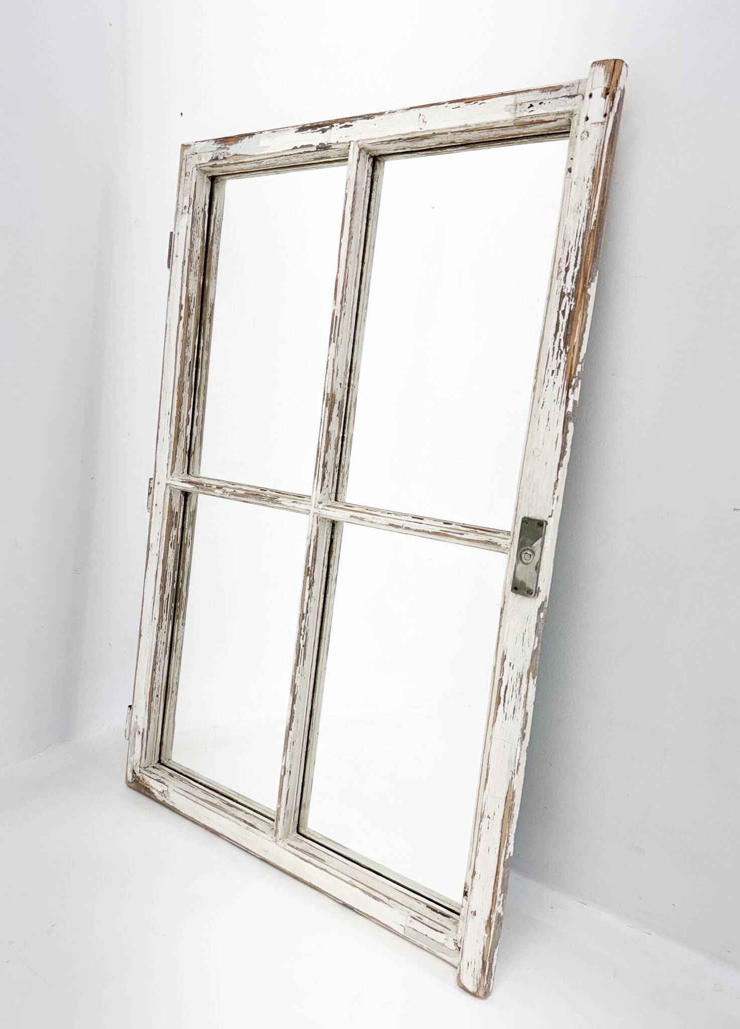 Vintage wooden window converted to a mirror