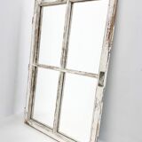 Vintage wooden window converted to a mirror