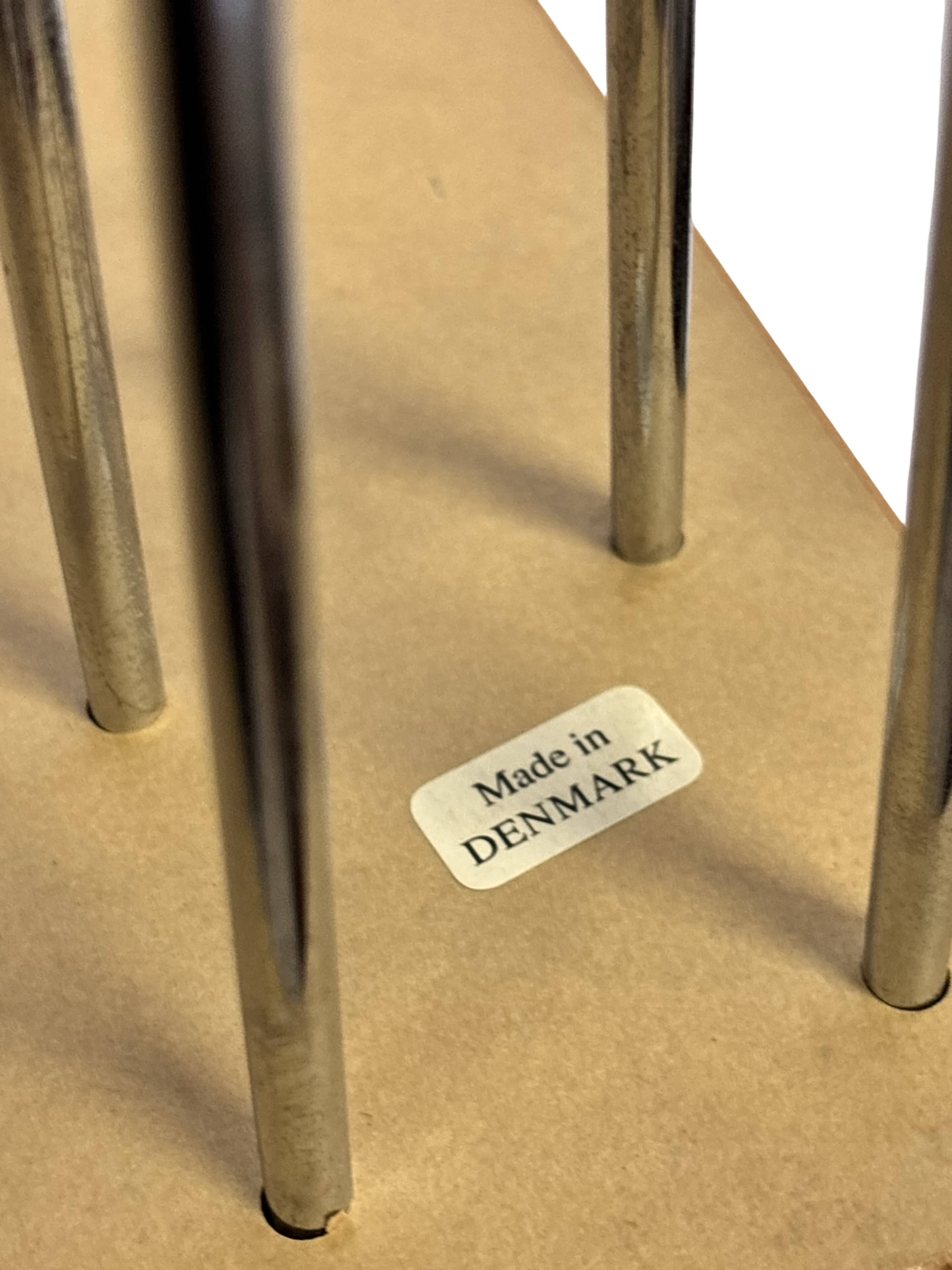 Vintage Danish triangular side table with hairpin legs design