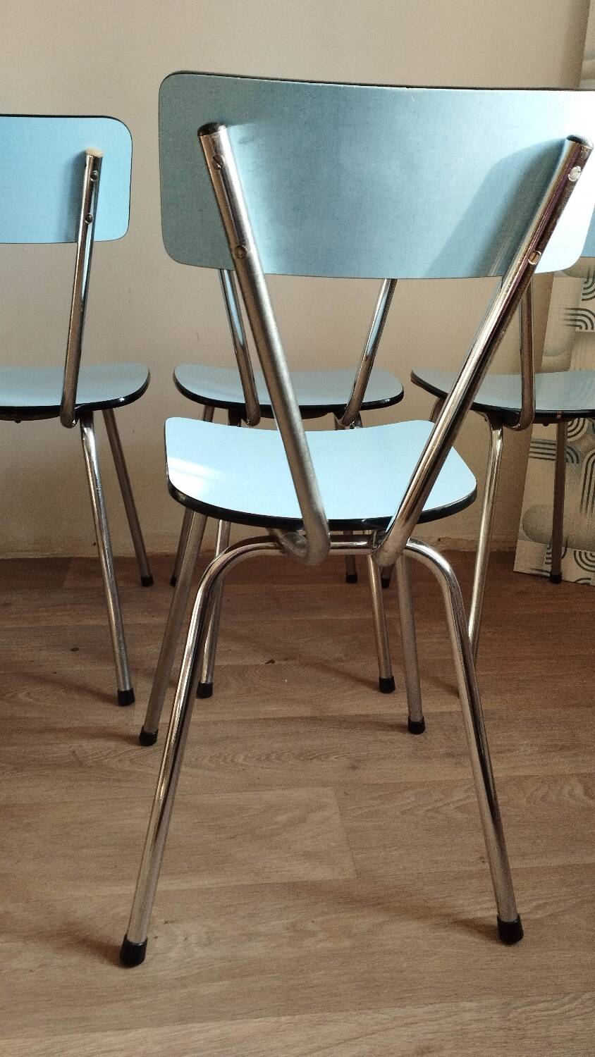 4 blue Formica chairs