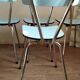 4 blue Formica chairs