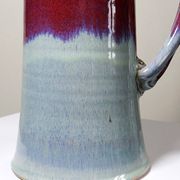 Large artistic stoneware vase by Lévéjac Michel Goldstyn, with flamed oxblood glaze.