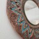 Glazed terracotta mirror