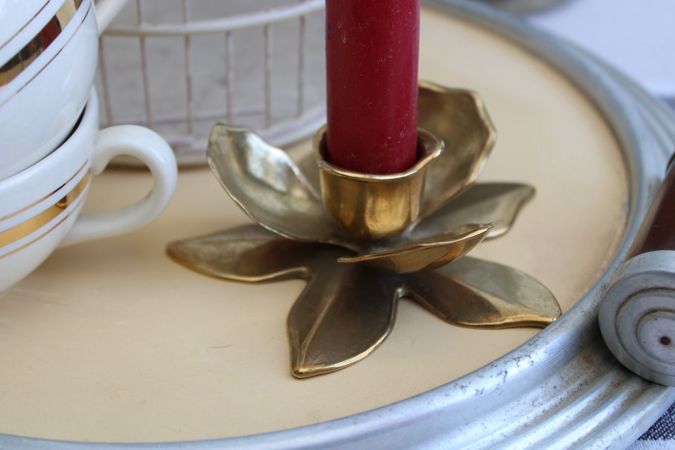 Golden brass candle holder