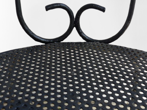 Pair of wrought iron garden chairs