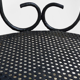 Pair of wrought iron garden chairs