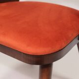 Scandinavian design orange papaya shell dining chairs