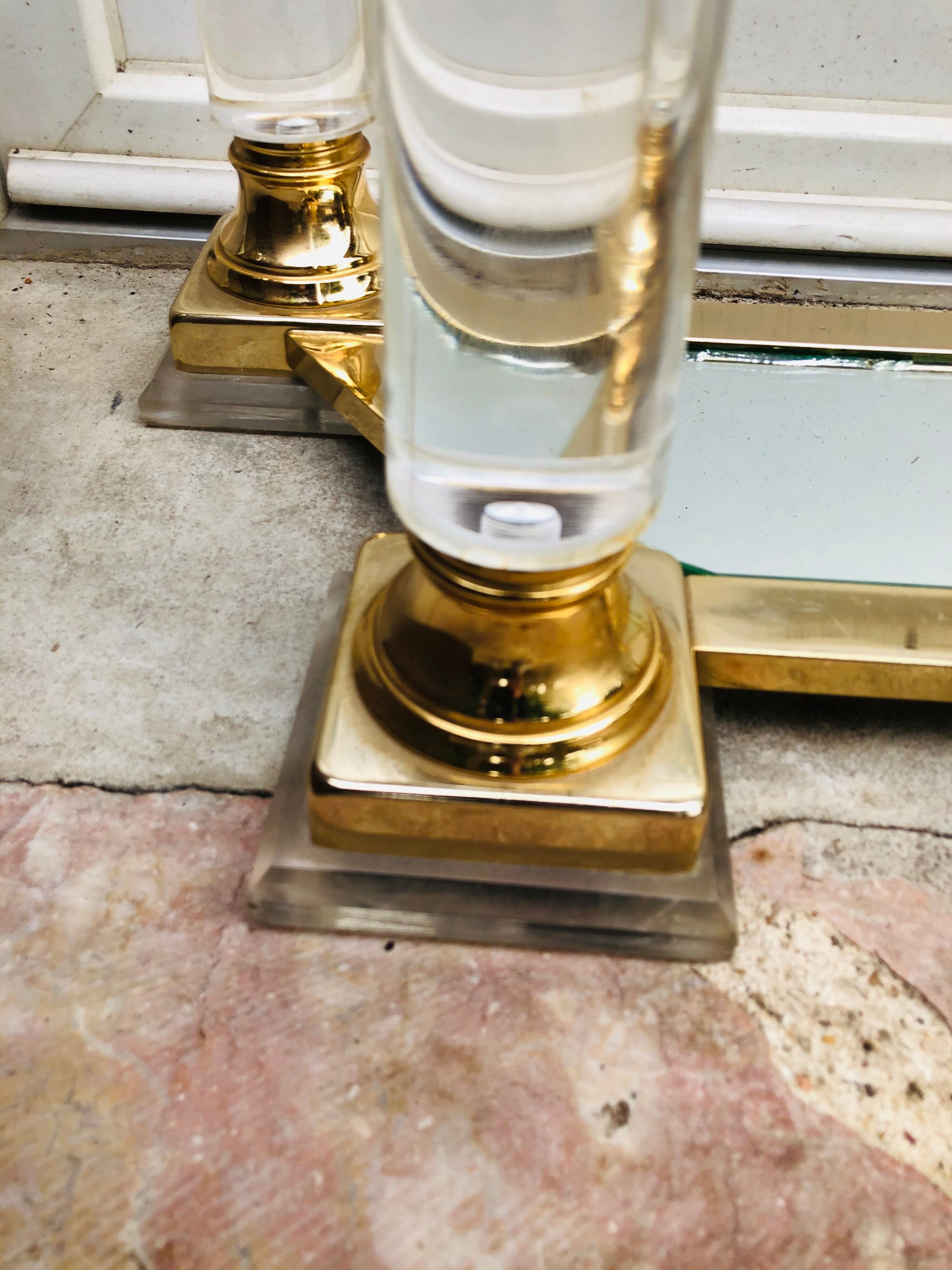 Console in Plexiglas and gold metal