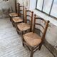 Set of 4 oak and straw chairs Dudouyt 1940