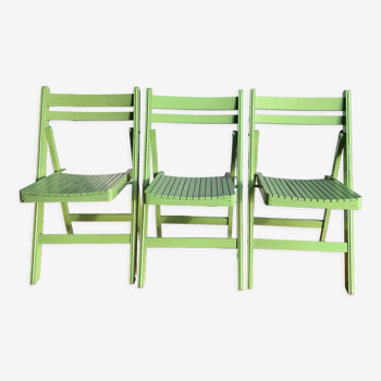 3 wooden folding chairs