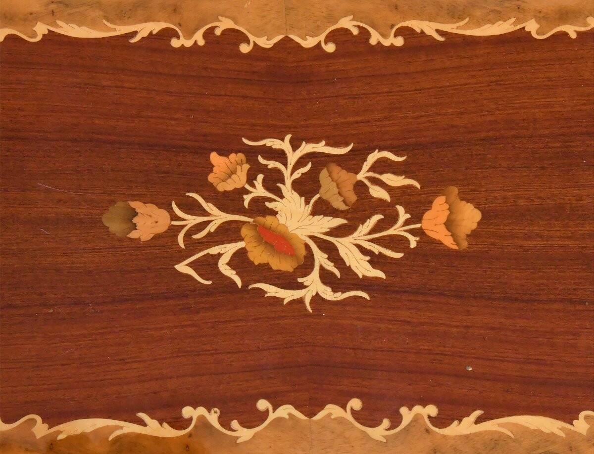 Serving table and rolling bar with drop leaves featuring floral marquetry decoration.