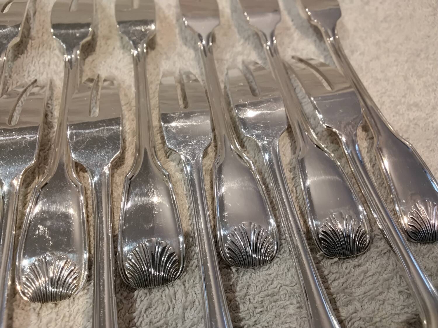 12 silver-plated metal snail forks by silversmith Noel Collet, shell design