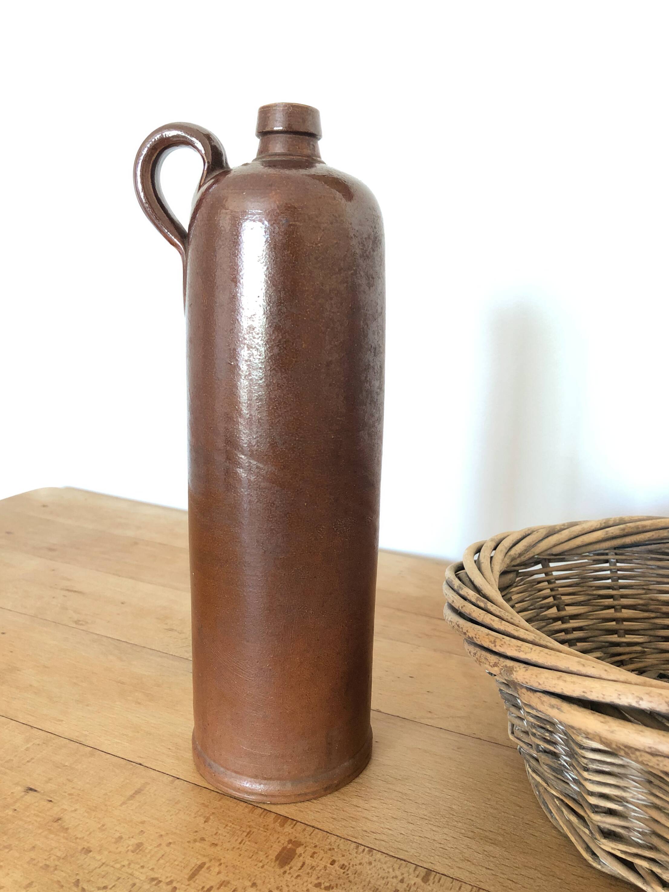 Set of 5 antique glazed stoneware bottles