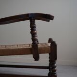 A pair of modern and sculptural vintage Danish armchairs in oak and papercord, 1940s.