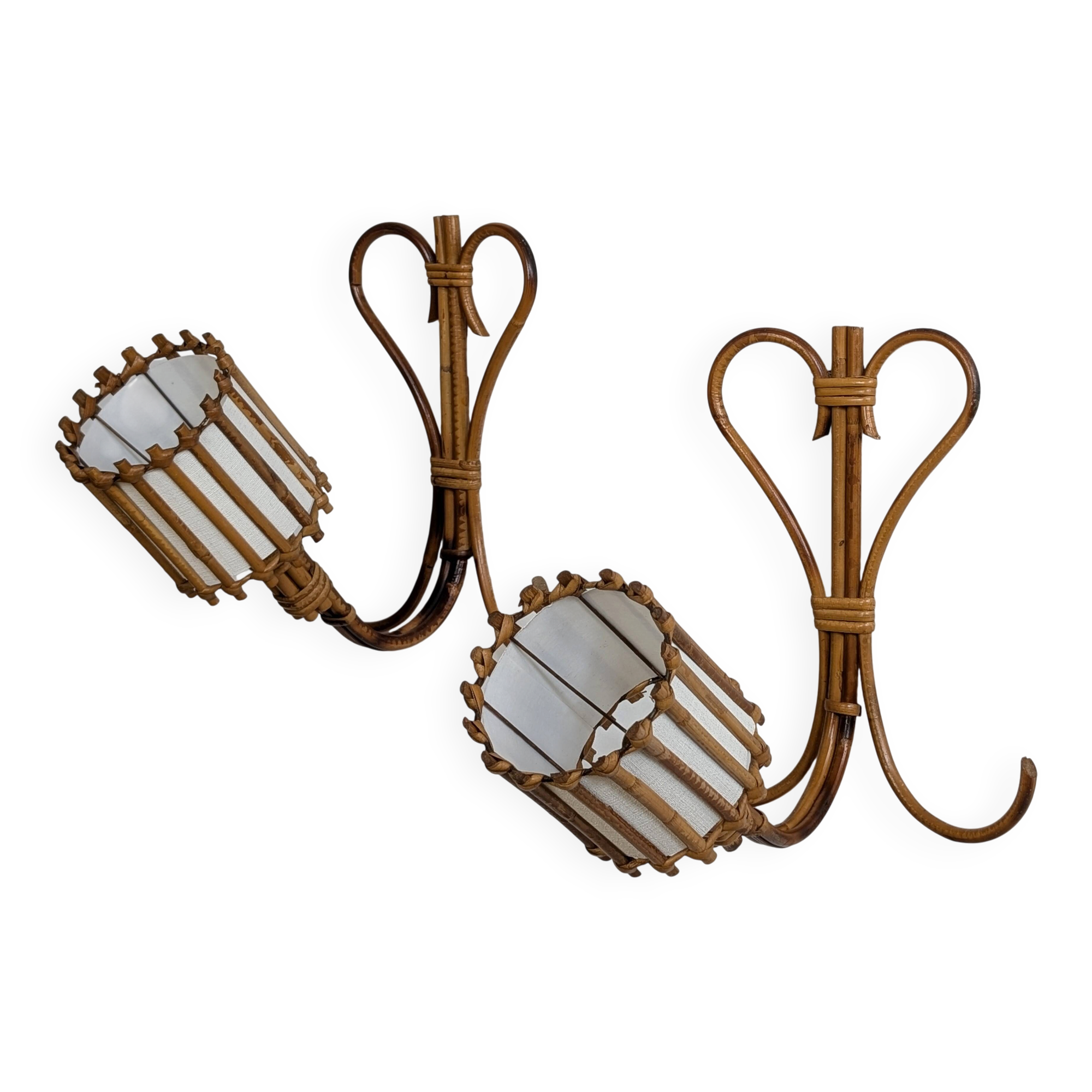 Rattan wall lights by Louis Sognot