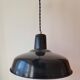 Duo of white and black enameled sheet metal pendants